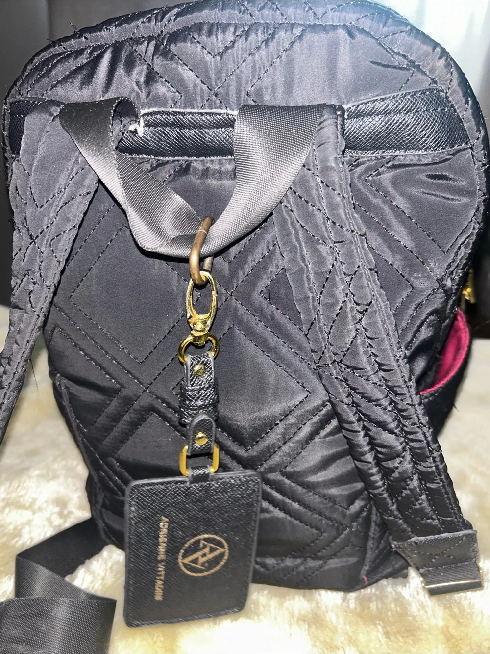 Adrienne Vittadini Black Quilted Backpack with Gold Accents